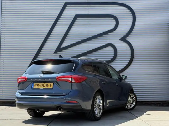 Ford Focus Wagon 1.0 EcoBoost Titanium Business 2e Eigenaar|Pano|Stoel+stuurverw|Adap Cruise|Carplay...
