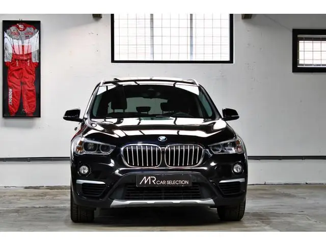 BMW X1 sDrive20i Orange Edition II | X-Line | Panoramadak | Head-Up | 18 inch | NL auto | 2e eigenaa...
