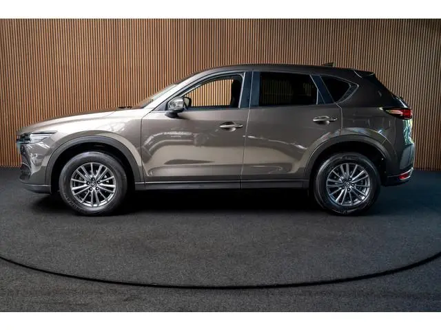 Mazda CX-5 2.0 SkyActiv-G 165 HUD Navi Camera PDC Stuurverw. Stoelverwarming Climate C. Cruise C. Af...