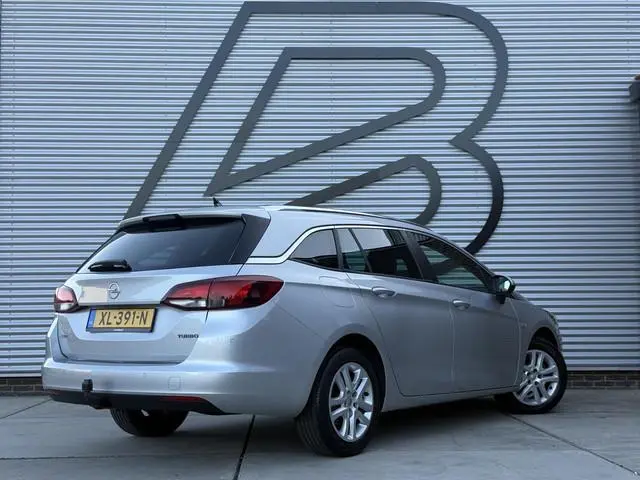 Opel Astra Sports Tourer 1.4 Turbo Online Edition 2e Eigenaar|Navi|Trekhaak|Clima|Cruise|Carplay|PDC...