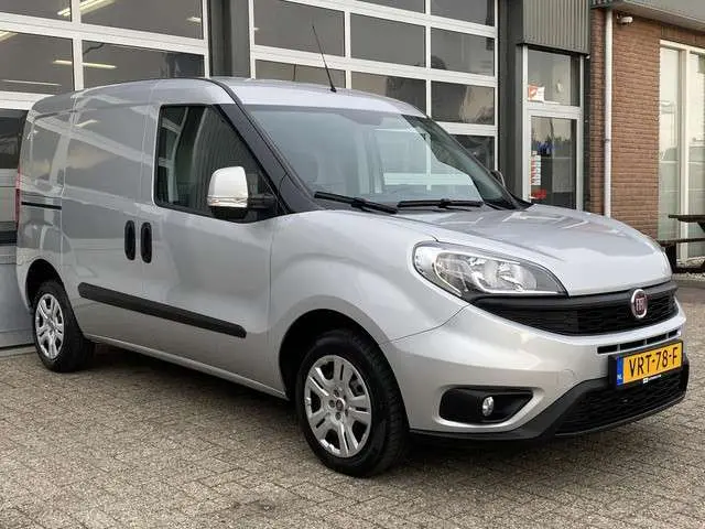 Fiat Doblò Cargo 1.3 MJ L1H1 SX 90pk Btw en Bpm vrij Airco Cruise controle Navigatie Tussenschot Parkeerhulp achter 1e eigenaar Ex overheid Euro 5 Marge