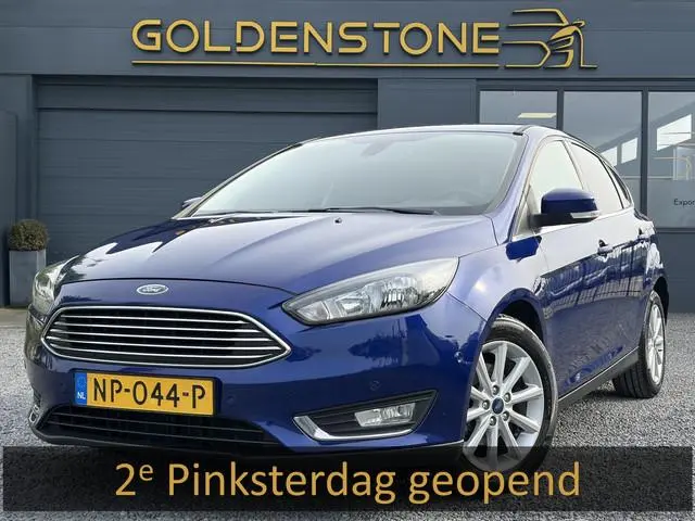 Ford Focus 1.0 Titanium 2e Eigenaar,Dealer Onderhouden,Navi,Pdc V+A,125pk,Clima,Cruise,6 Bak,Lm velg...