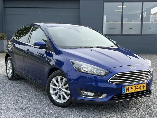 Ford Focus 1.0 Titanium 2e Eigenaar,Dealer Onderhouden,Navi,Pdc V+A,125pk,Clima,Cruise,6 Bak,Lm velg...