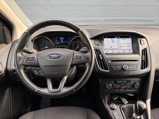 Ford Focus 1.0 Titanium 2e Eigenaar,Dealer Onderhouden,Navi,Pdc V+A,125pk,Clima,Cruise,6 Bak,Lm velg...