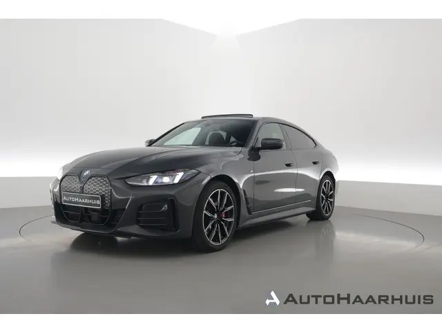 BMW i4 eDrive40 M Sport Pro 84 kWh | S/K-Dak | Elek. Trekhaak | Shadowline | Widescreen | Adapt. Cru...