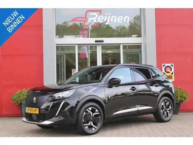 Peugeot 2008 1.2 100PK ALLURE PACK | AFNEEMBARE TREKHAAK | NAVIGATIE | STOEL VERWARMING | ALL SEASON...