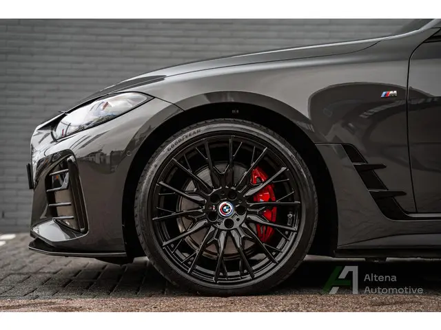 BMW i4 M50 High Executive 84 kWh carbon, co-pilot, M-sportstoelen, trekhaak, Harman kardon, Dravid,