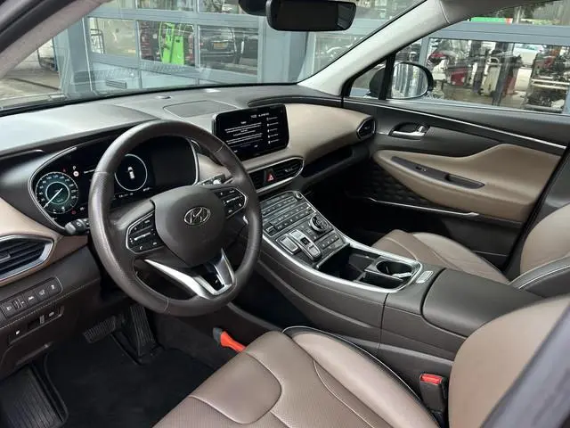 Hyundai Santa Fe 1.6 T-GDI PHEV Premium 7p. | SOH 97% | Leder | Stoelverwarming