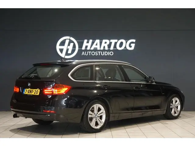 BMW 3-serie Touring 316i High Executive SPORTSTOELEN / LEDER / GROTE NAVI / AFN. TREKHAAK