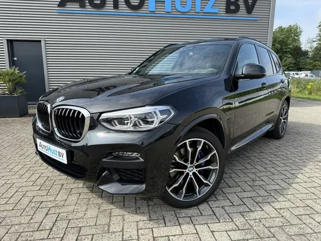 BMW X3 xDrive30e High Executive M Sport LED Panoramadak Trekhaak 20 Inch LMV Carplay Lederen interie...