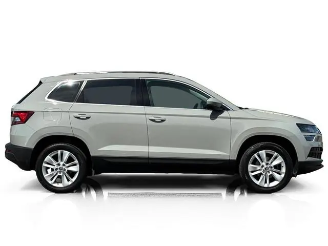 Skoda Karoq 1.0 TSI ✅ Pano ✅ CarPlay ✅ Stoelverwarming