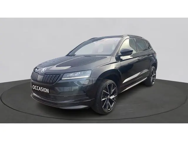 ŠKODA Karoq 1.5 TSI ACT 150pk DSG Sportline Business Panorama Trekhaak Camera Stoelverwarming Carpla...