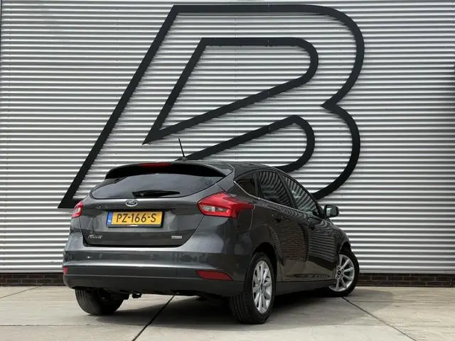 Ford Focus 1.0 Titanium Navi|Clima|Cruise|PDC V+A|Carplay|N.A.P|APK tot 01-2027