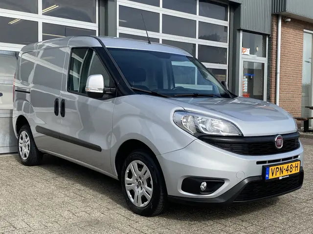 Fiat Doblò Cargo 1.3 MJ L1H1 SX Btw en Bpm vrij Airco Cruise controle Navigatie Tussenschot Parkeerh...