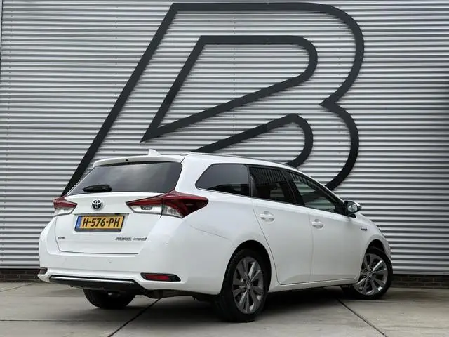 Toyota Auris Touring Sports 1.8 Hybrid Lease pro 1e Eigenaar|Navi|Camera|Clima|Cruise|PDC|APK tot 01...