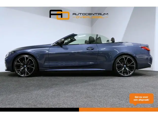 BMW 4-serie Cabrio M440i xDrive High Executive / Air Collar (nekverwarming / BMW Laserlight / Elektr...