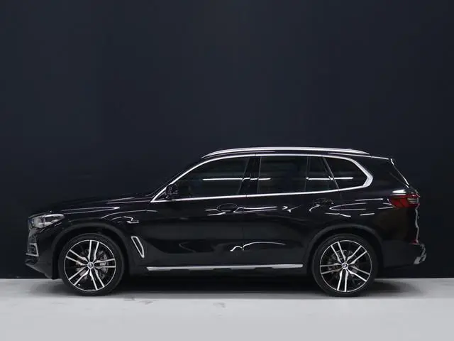 BMW X5 xDrive45e M Sport [LUCHTVERING, SCHUIFKANTELDAK, APPLE CARPLAY, MEMORY SEATS, CAMERA, ADAPTIV...