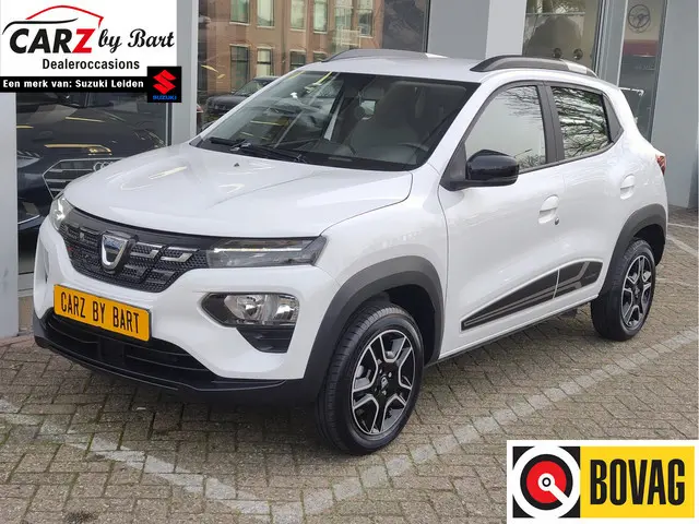 Dacia Spring COMFORT 27 kWh SoH 94%! | Airco | Cruise | Halfleder