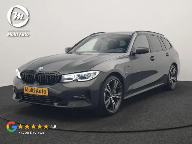BMW 3-serie Touring 330e Sportline PHEV 293pk Dealer O.H. | Dravitgrau | Trekhaak Af Fabriek | Adapt...