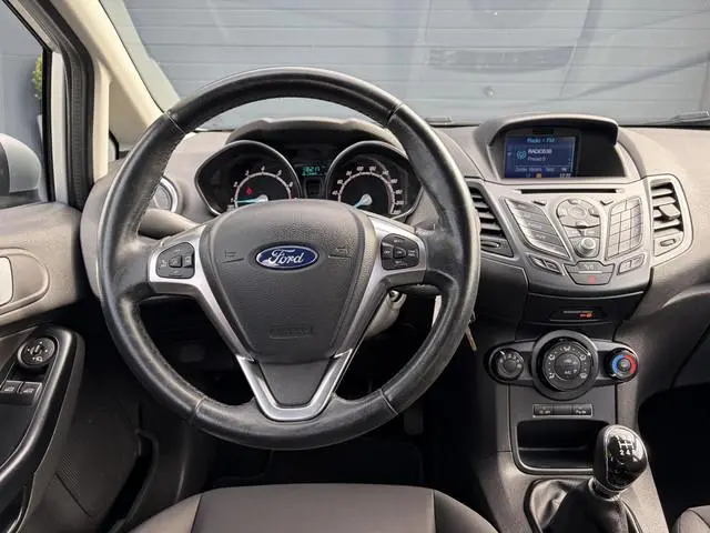 Ford Fiesta 1.0 Style Ultimate Navi,Airco,Cruise,Pdc V+A,5 Deurs,Lm velgen,N.A.P,Zeer Zuinig,Apk tot...