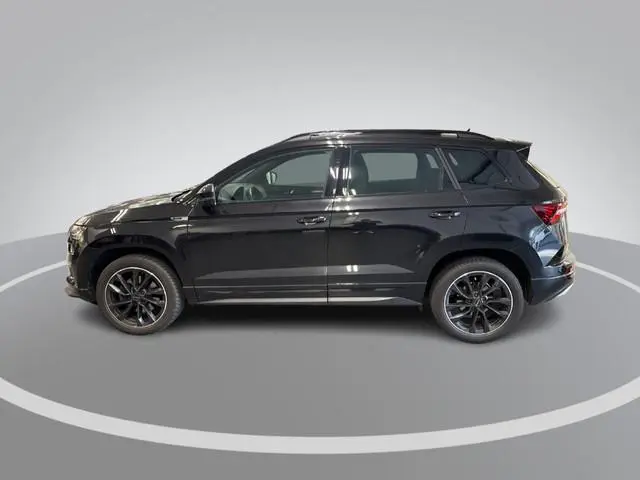 Skoda Karoq 1.5 TSI 150pk DSG ACT Sportline Business · Panoramadak · Camera · Keyless · Matrix LED ·...