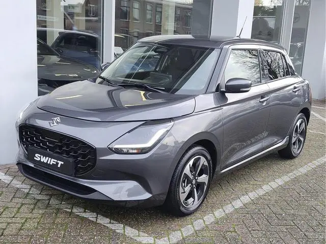 Suzuki Swift 1.2 STYLE SMART HYBRID AUTOMAAT Direct Leverbaar | Tot 10 JAAR GARANTIE! | Inclusief €...