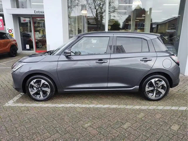 Suzuki Swift 1.2 STYLE SMART HYBRID AUTOMAAT Direct Leverbaar | Tot 10 JAAR GARANTIE! | Inclusief €...