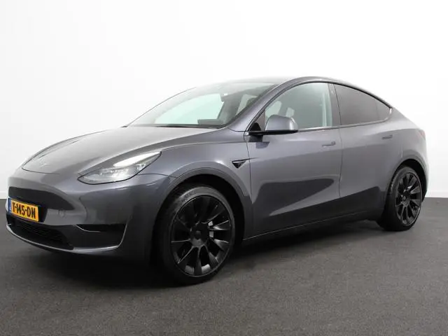 Tesla Model Y RWD 58 kWh  Panorama dak 20" Wheels PDC VA 360 Camera Full LED Leder Autopilot