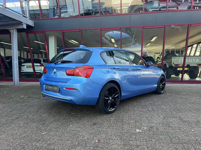 BMW 1-serie 118i Corporate Lease Executive | CC | Camera | Sportstoelen | PDC | Winterwielen |