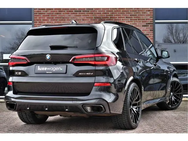 BMW X5 xDrive45e M-Sport SkyLounge M-zetels 4WS ACC Trekh 360 2xTV Carbon HUD