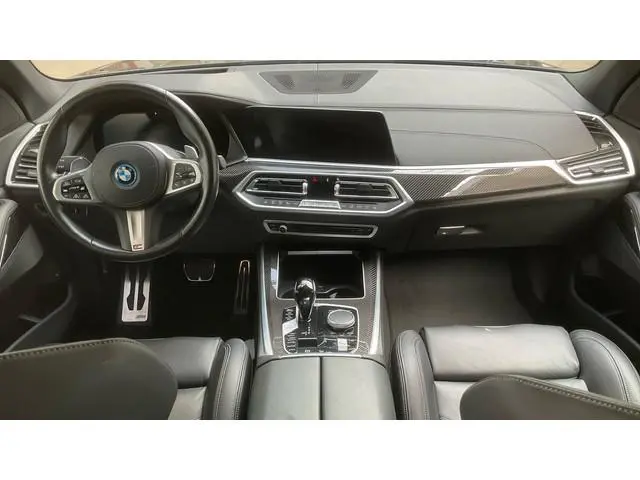 BMW X5 xDrive45e M-Sport SkyLounge M-zetels 4WS ACC Trekh 360 2xTV Carbon HUD