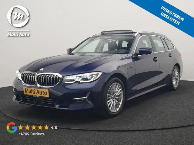 BMW 3-serie Touring 330e Luxury Line PHEV 293pk Dealer O.H. | Trekhaak Af Fabriek | Panodak | Head U...
