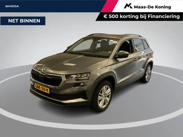 Skoda Karoq 1.5 TSI ACT 150pk DSG Business Edition · Camera · Inklap. Trekhaak · Keyless · Stuur- &...