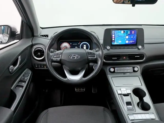 Hyundai Kona EV Comfort 39 kWh | All-seasons | Trekhaak | Navi by App