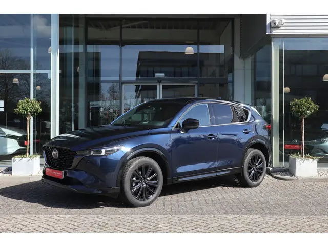 Mazda CX-5 2.0 e-SkyActiv-G M Hybrid 165 Homura Trekhaak / Bose / Camera / Head-Up / Leer / Navi / C...