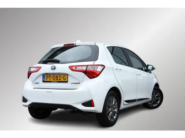 Toyota Yaris 1.5 Hybrid Executive, LM Velgen, Cruise control, Navi, Climate control, Safety Sense.
