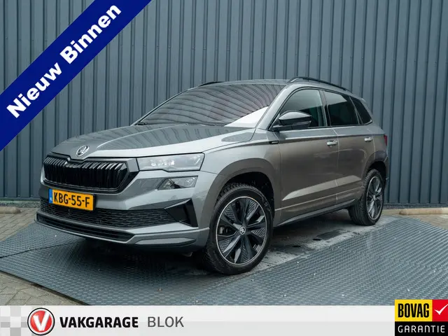 ŠKODA Karoq 1.5 TSI ACT Sportline Business | Elk. A-klep | Camera | Lane Assist | Stoel & Stuur verw...