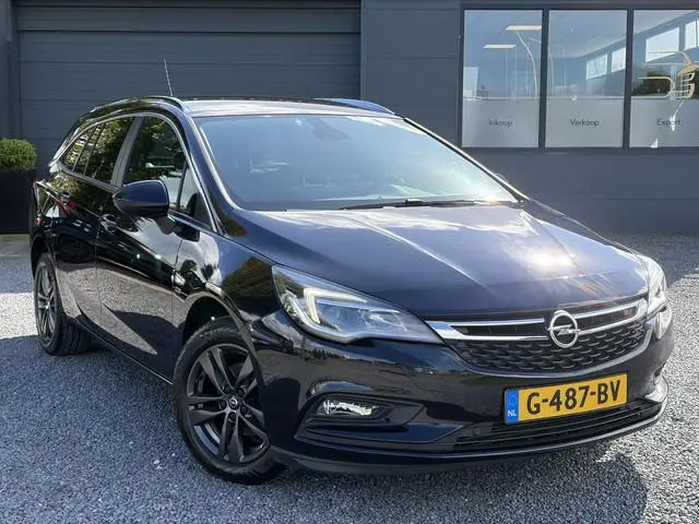 Opel Astra Sports Tourer 1.4 Turbo 120 Jaar Edition ✓150pk✓Carplay✓Navi✓Trekhaak✓Pdc V+A✓Clima✓Cruis...