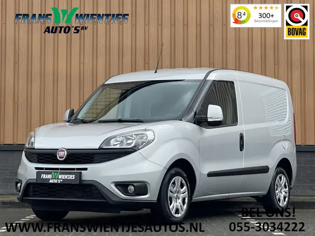 Fiat Doblò 1.3 MJ L1 | Ex. BTW | Trekhaak | | Navigatie | Airconditioning | Cruise Control | Bluetooth | DAB | Multifunctioneel Stuurwiel | Elektrische Spiegels | Elektrische Ramen |