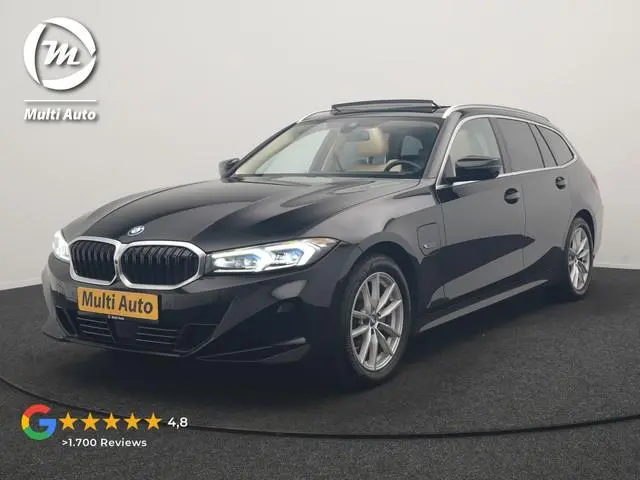 BMW 3-serie Touring 320e Luxury Line Facelift PHEV Dealer O.H. | Trekhaak Af Fabriek | Panodak | Hea...