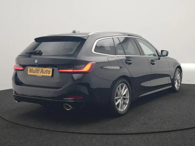 BMW 3-serie Touring 320e Luxury Line Facelift PHEV Dealer O.H. | Trekhaak Af Fabriek | Panodak | Hea...