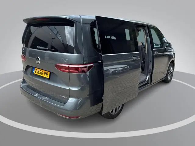 Volkswagen Multivan 1.4 218pk DSG eHybrid L2H1 Life Business · Glazen dak · Trekhaak · Camera · Elek...