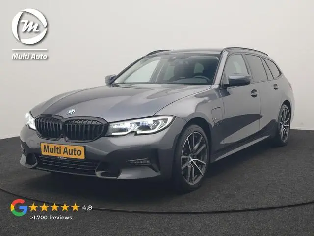 BMW 3-serie Touring 320e xDrive Sportline PHEV 204pk Dealer O.H | SOH 88,1% | Trekhaak Af Fabriek |...