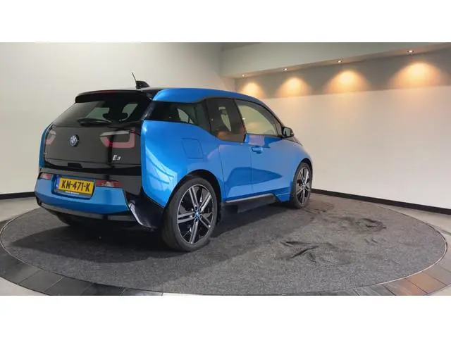 BMW i3 Basis 94Ah 33 kWh - Design Suite | Elektr. schuif/kanteldak | H&K Audio |LMV 20'' | 1e eigena...