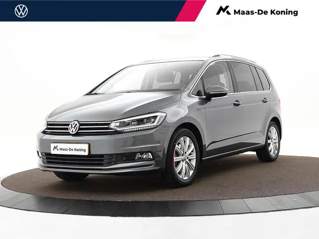 Volkswagen Touran 1.4 TSI 150pk DSG Highline 7p · Camera · Keyless · Massagefunctie Bestuurder · Sto...