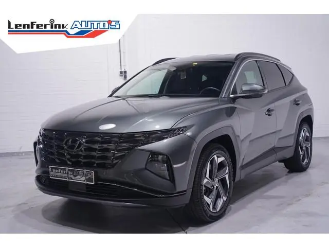 Hyundai Tucson 1.6 T-GDI HEV Premium 1e eign. NAP Navigatie DAB ACC ECC Bleutooth stoel/stuur verwar...