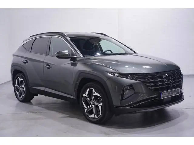 Hyundai Tucson 1.6 T-GDI HEV Premium 1e eign. NAP Navigatie DAB ACC ECC Bleutooth stoel/stuur verwar...