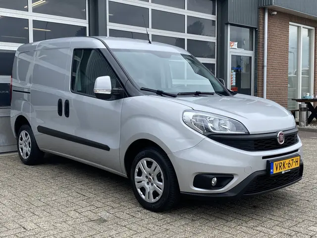 Fiat Doblò Cargo 1.3 MJ L1H1 SX Btw en Bpm vrij Airco Cruise controle Navigatie Tussenschot Parkeerh...