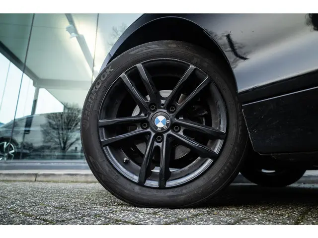 BMW 1-serie 118i Corporate Lease Executive Dealer Onderhouden | Stoelverwarming