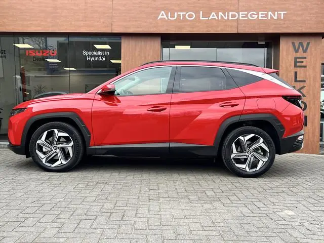 Hyundai Tucson 1.6 T-GDI HEV Comfort Plus Sky | Schuif/Kanteldak | Trekhaak | Add. Cruise control